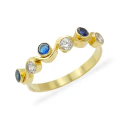 Designový zlatý prsten s modrými a čirými zirkony 2,44g