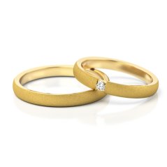 Minimalistická sada snubních prstenů s diamantem